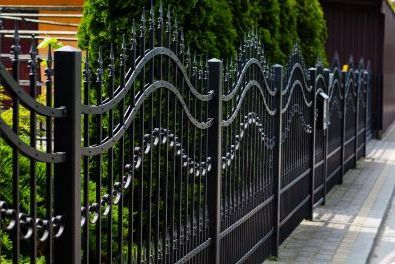Residential property with a newly installed black-painted metal fence in Hobart TAS.