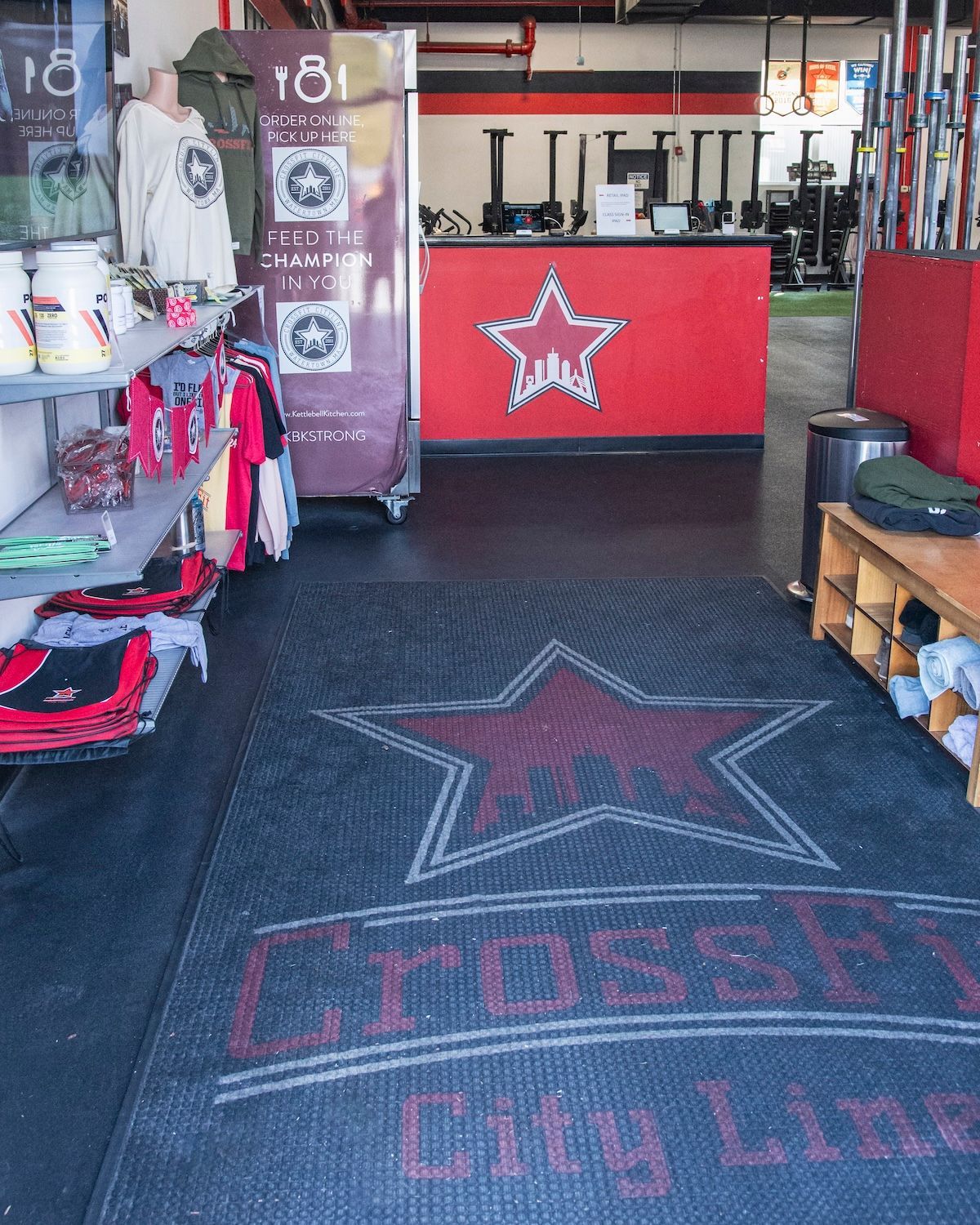 A crossfit city line gym with a red star on the floor