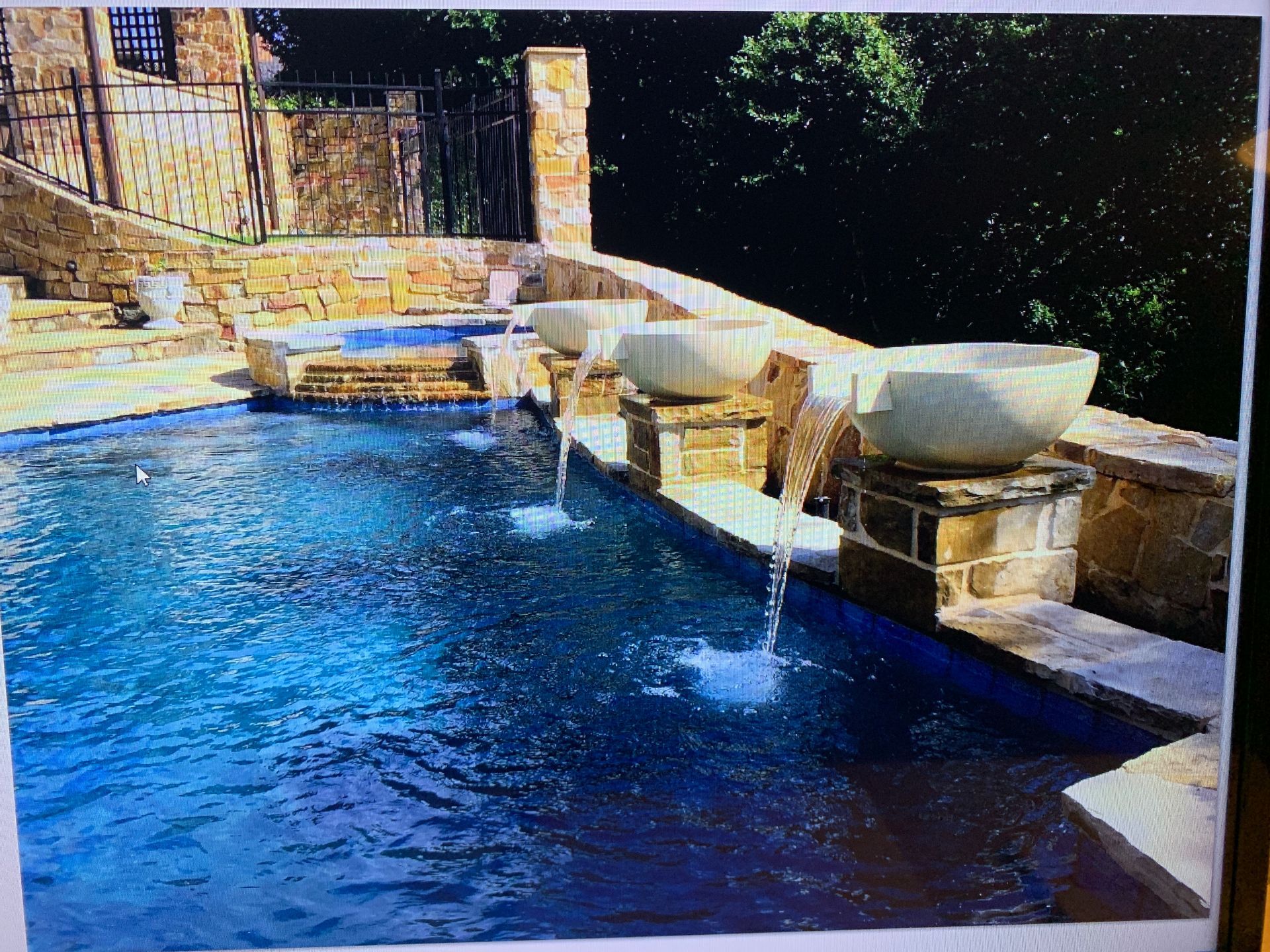 A picture of a swimming pool with bowls in it