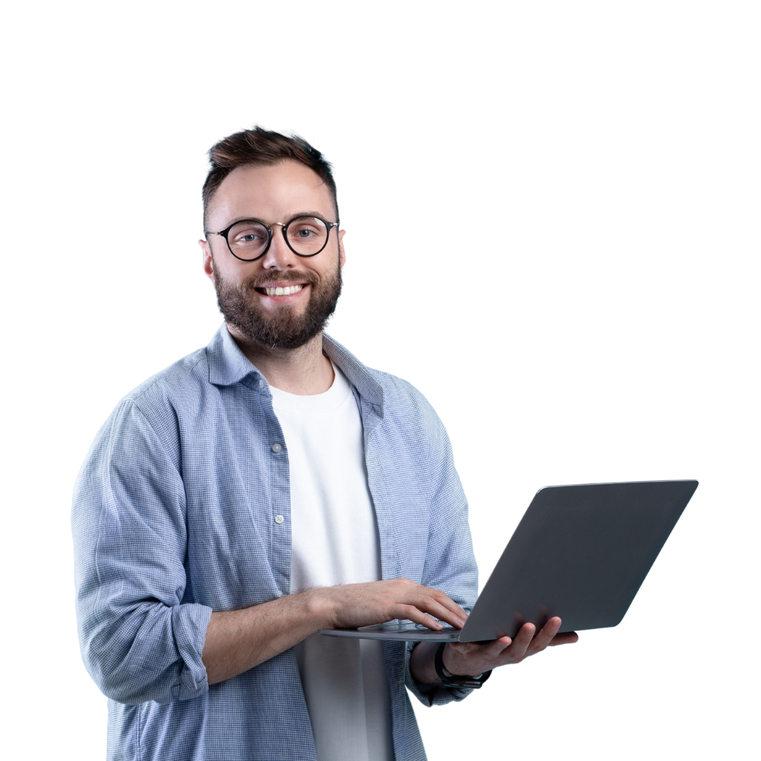 A man wearing glasses is holding a laptop computer in his hands.