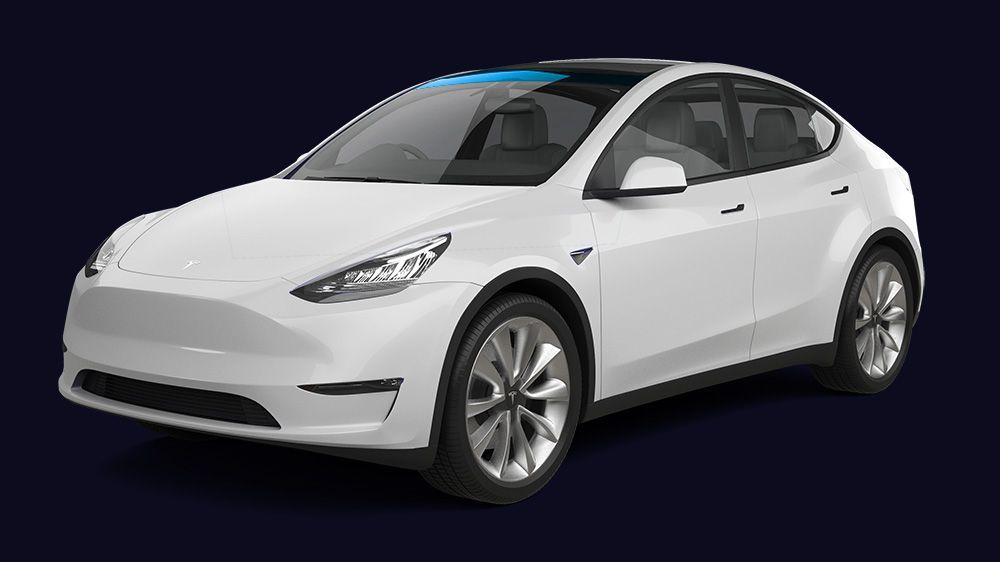 A white tesla model y is shown on a dark blue background.