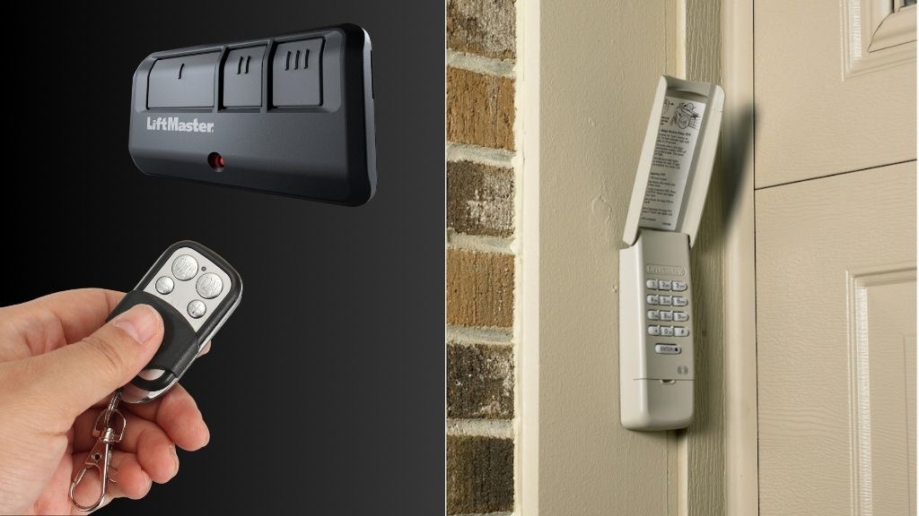 A person in black gloves uses a smartphone and a smart wall panel to open a garage door with a truck parked inside.