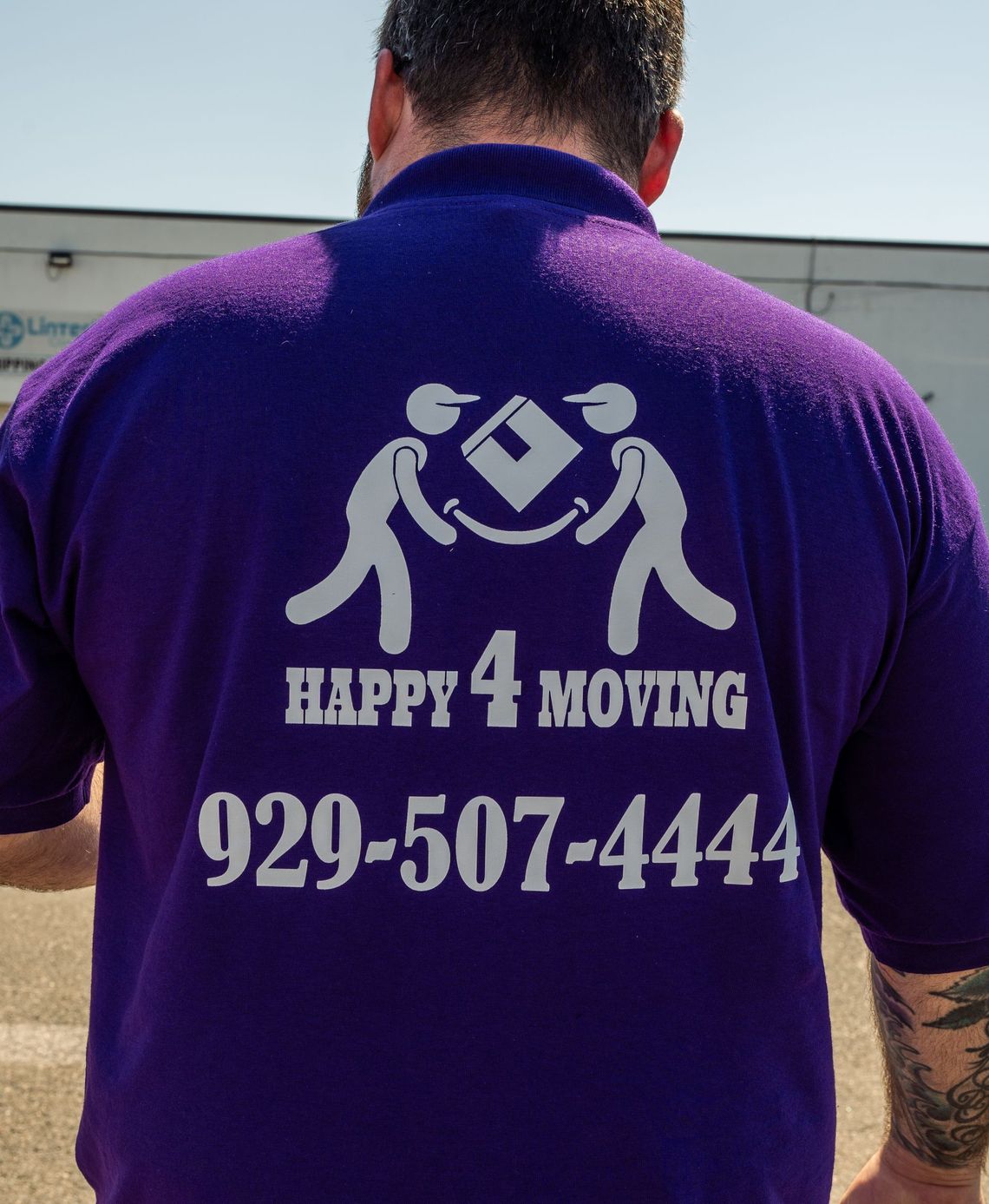 Man in purple shirt with 