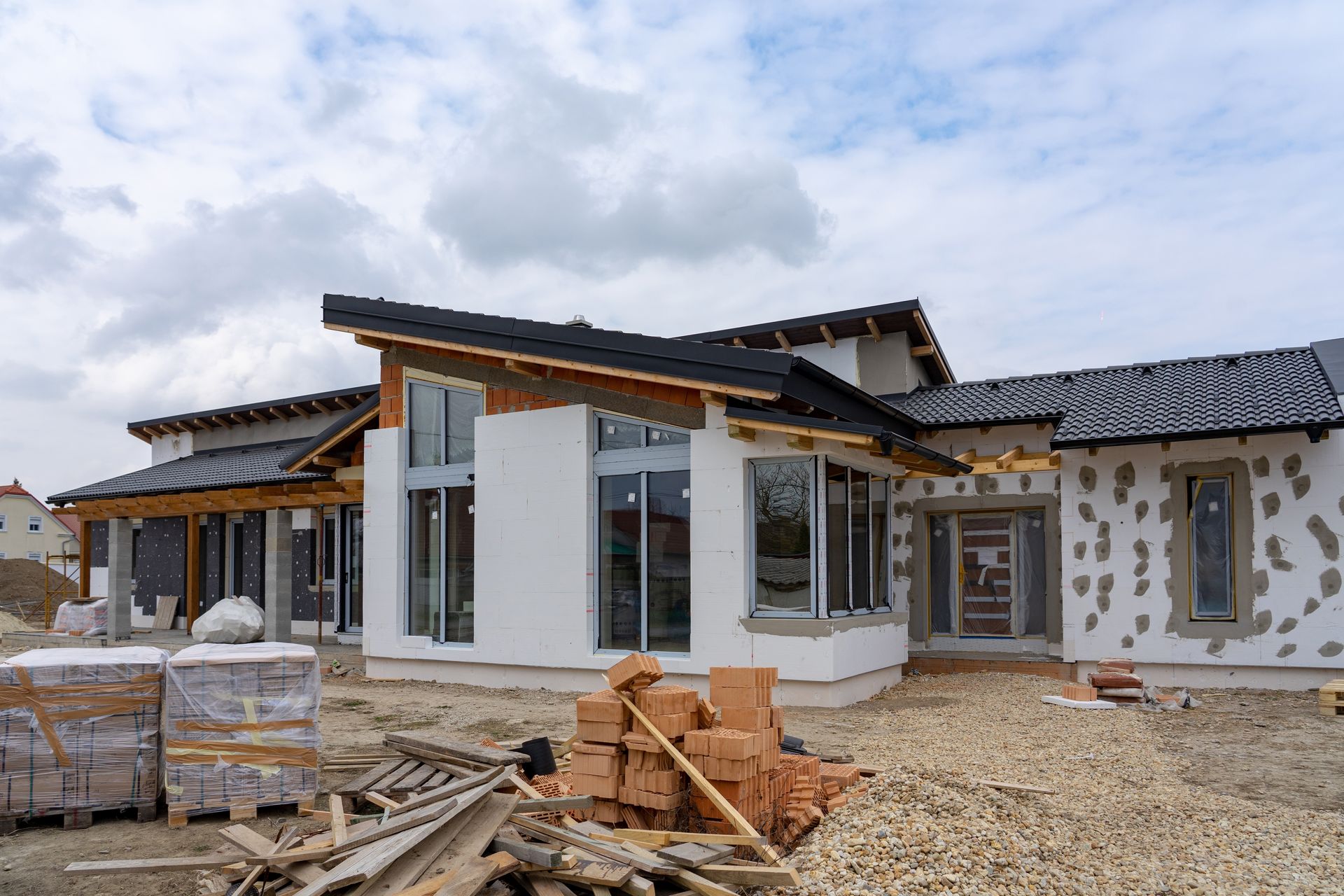 A large house is being built in a rural area.