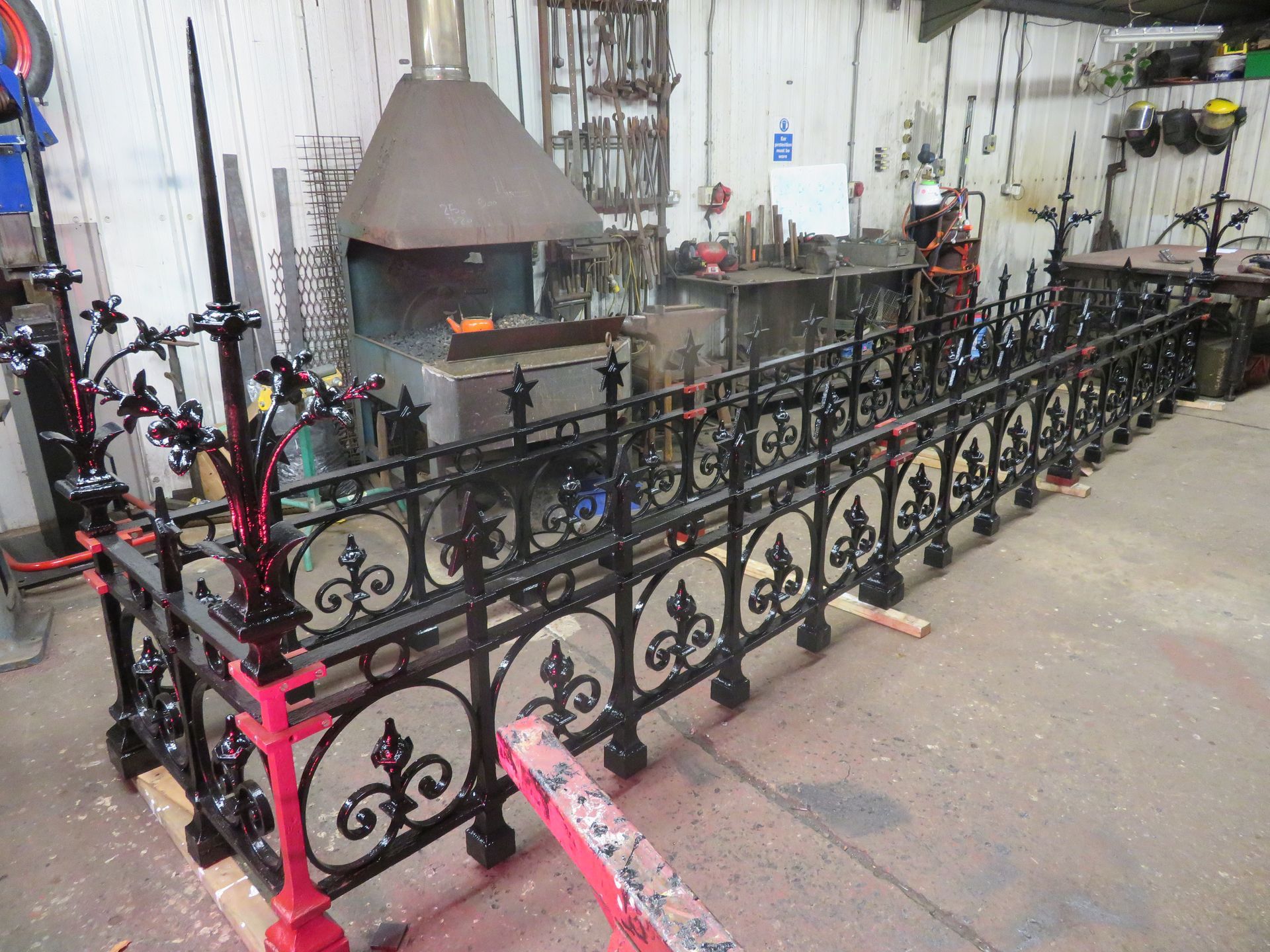 Irish Embassy Heritage Ironwork, Westminster, London..  Mixture of Wrought iron and cast iron listed ironwork.  Restoration project carried out in 2017 to repair and conserve rooftop ironwork.
