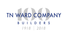 The logo for tn ward company builders is blue and white.