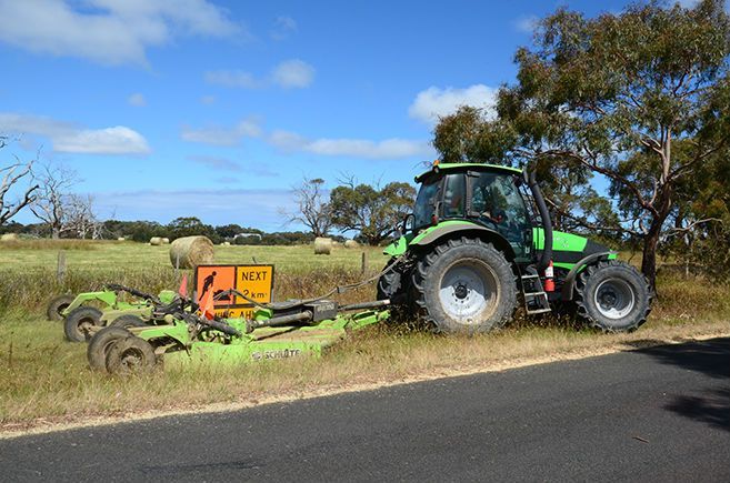 A Tractor Makes Some Grass Slashing | Ararat, Vic | Ararat Auto & Ag Services