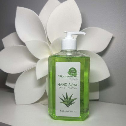 A green bottle of silky household hand soap