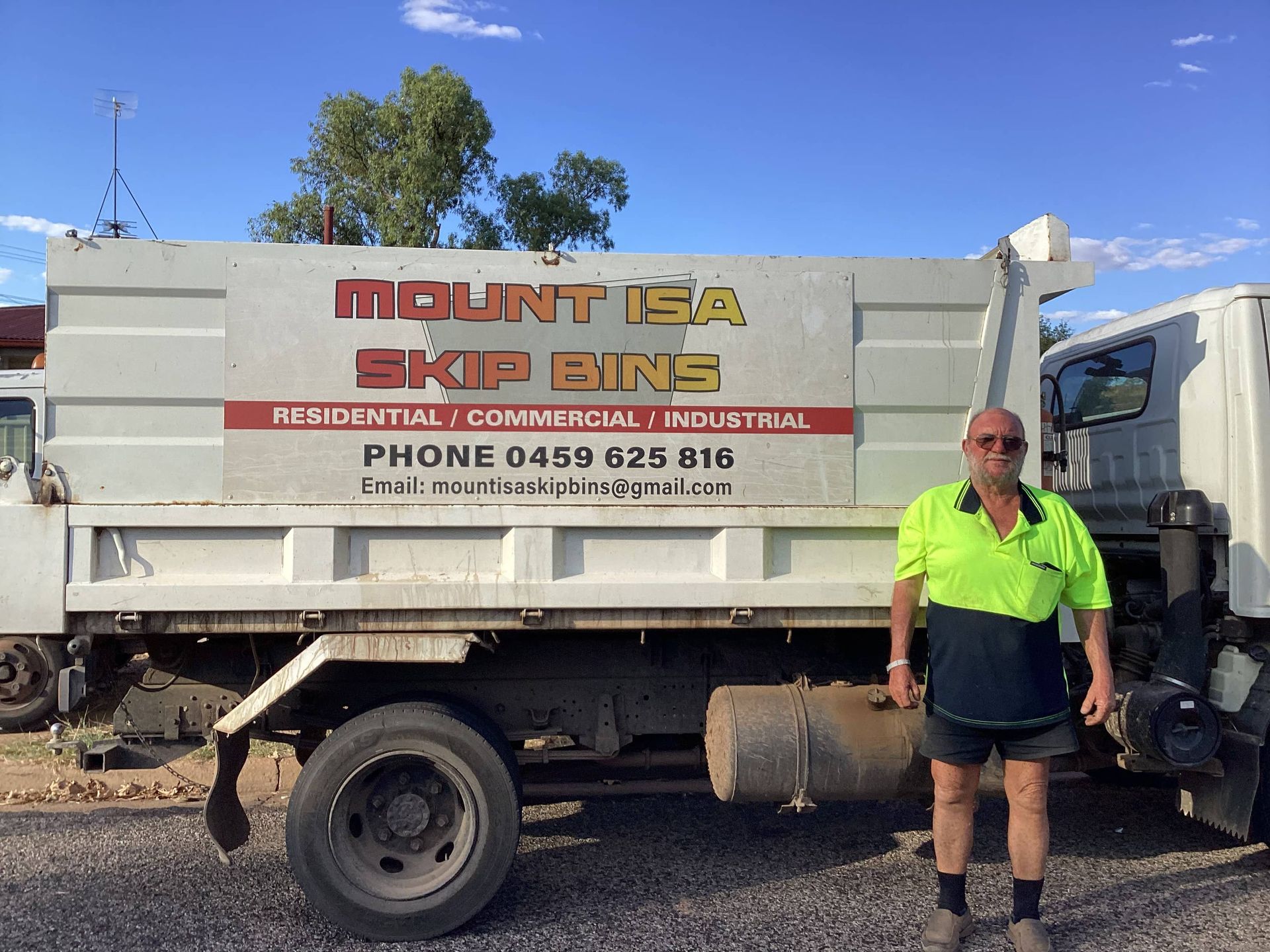 A Garbage Truck Dumping Waste at a Facility — Mount Isa Skips In Mount Isa, QLD