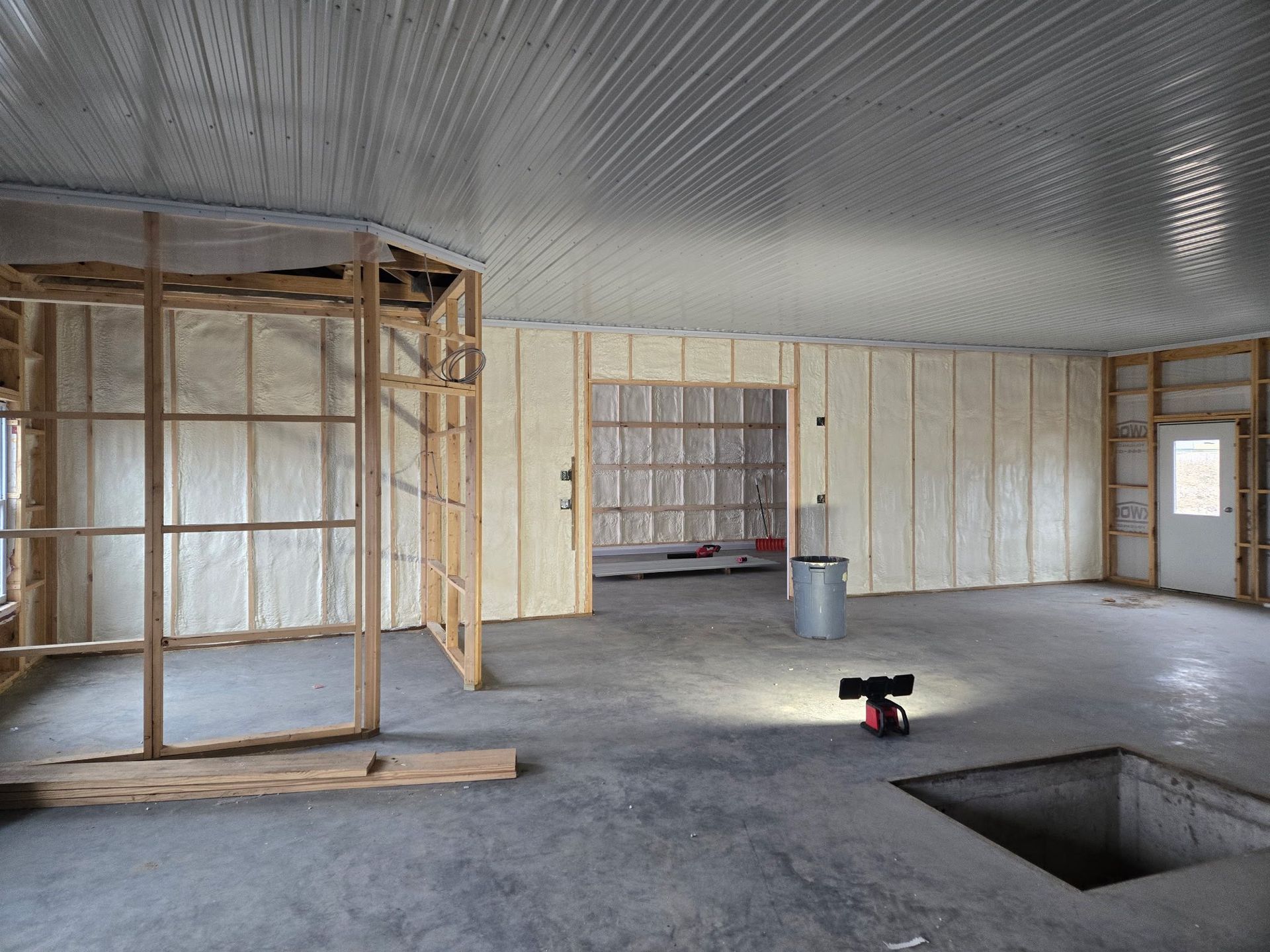 Interior construction site with spray foam insulation