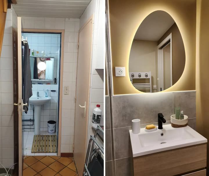 Une salle de bain avec un lavabo et un grand miroir à Fécamp en Normandie