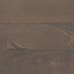 A close up of a wooden floor with a grain pattern.