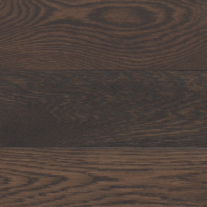 A close up of a dark brown wooden floor.