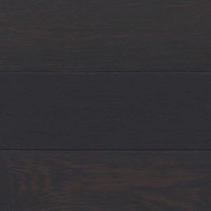 A close up of a black wooden surface.