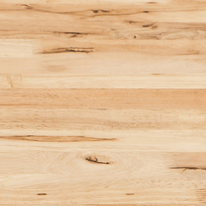 A close up of a piece of wood that looks like a cutting board.