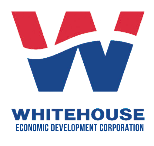 The logo for the whitehouse economic development corporation