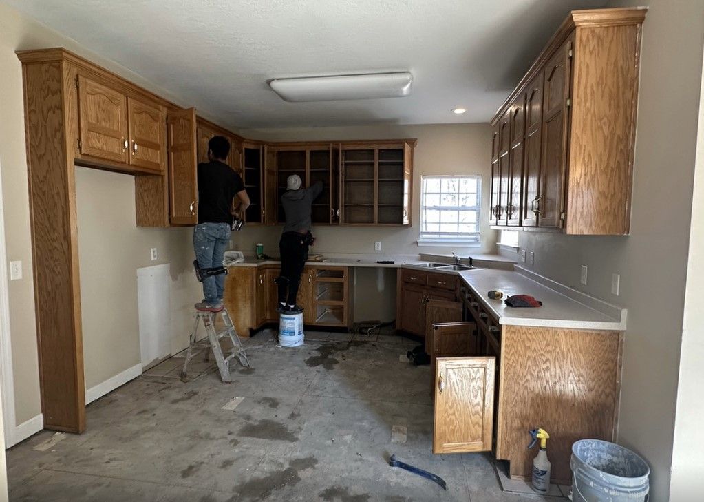 Kitchen undergoing renovation with cabinet updates and flooring prep — home remodeling Chattanooga.