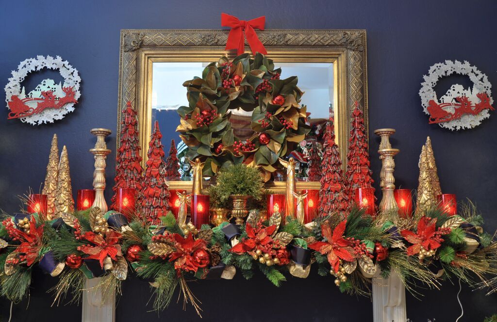 Holiday decor and pine garland on mantel