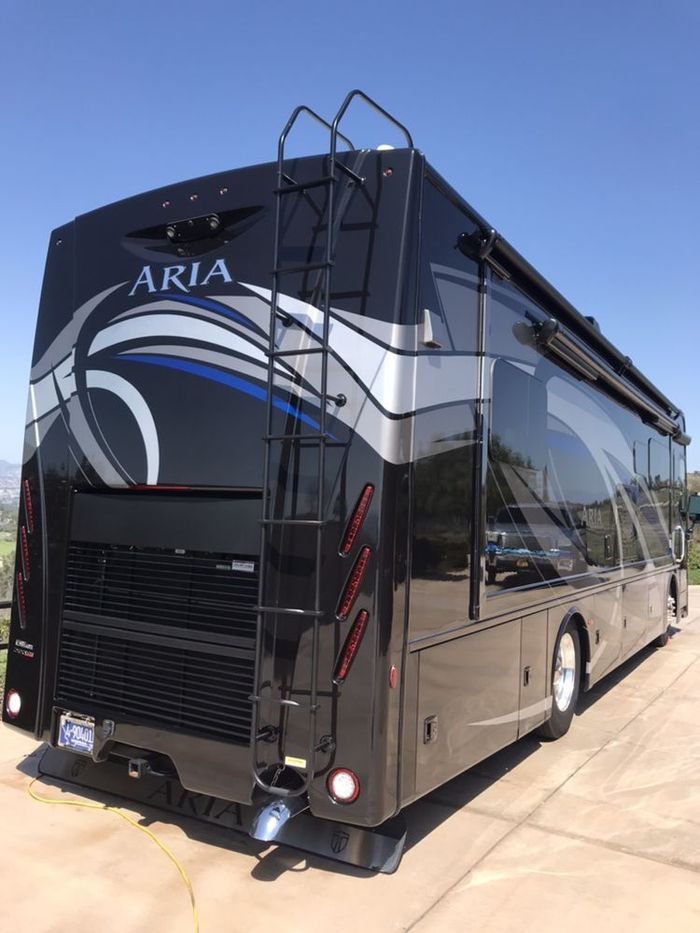 Black RV With Decals