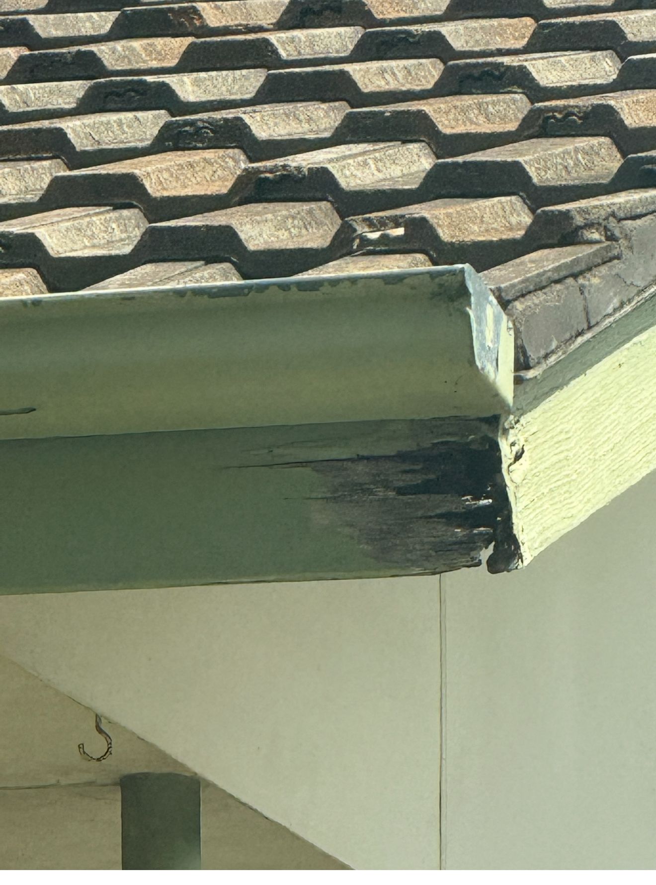 A close up of a gutter on a roof of a house — CBR Maintenance In Tuggeranong, ATC
