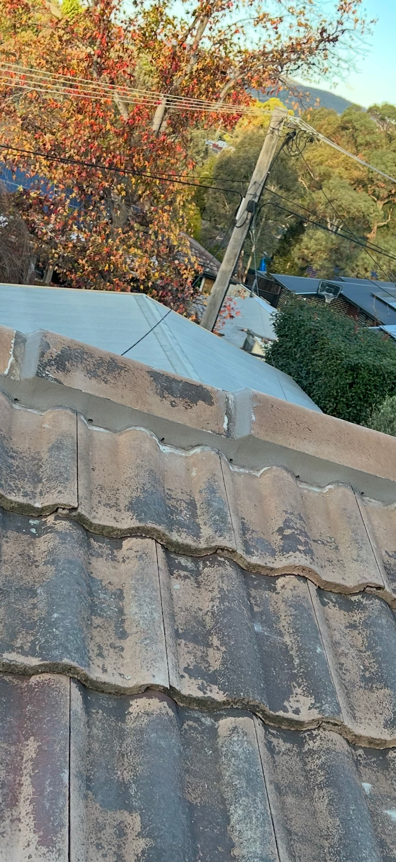 A Close Up of damaged roof tiles — CBR Maintenance In Curtin, ATC