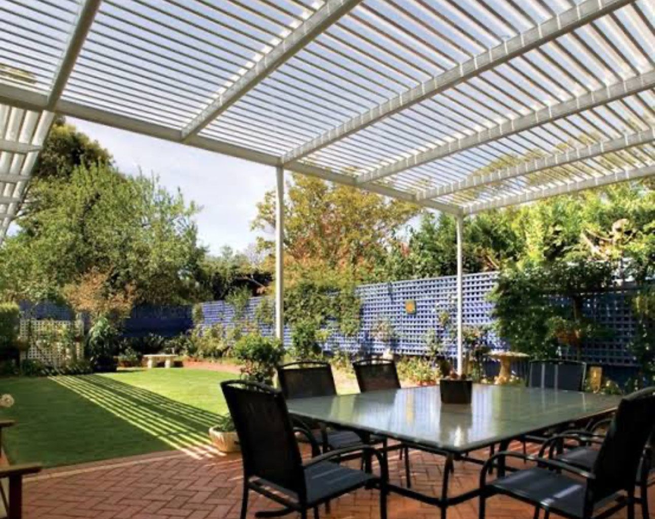 A White Pergola With Table And Chairs  — CBR Maintenance In Curtin, ATC