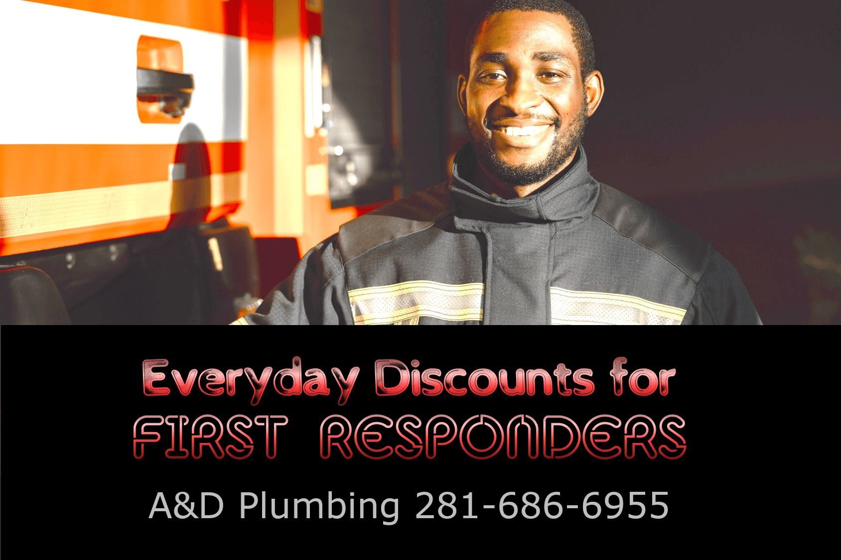 Smiling firefighter in uniform with 