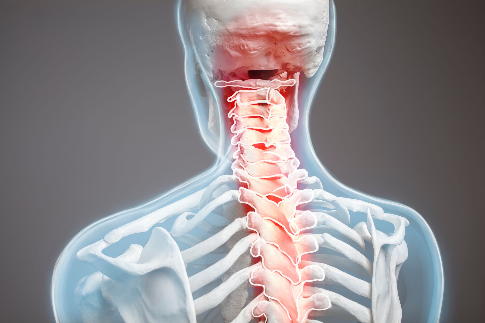 People in white t-shirts are fixated on their smartphones, lit by a dim light.