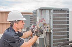 Technician and Capacitor — New HVAC Systems in Knoxville, TN