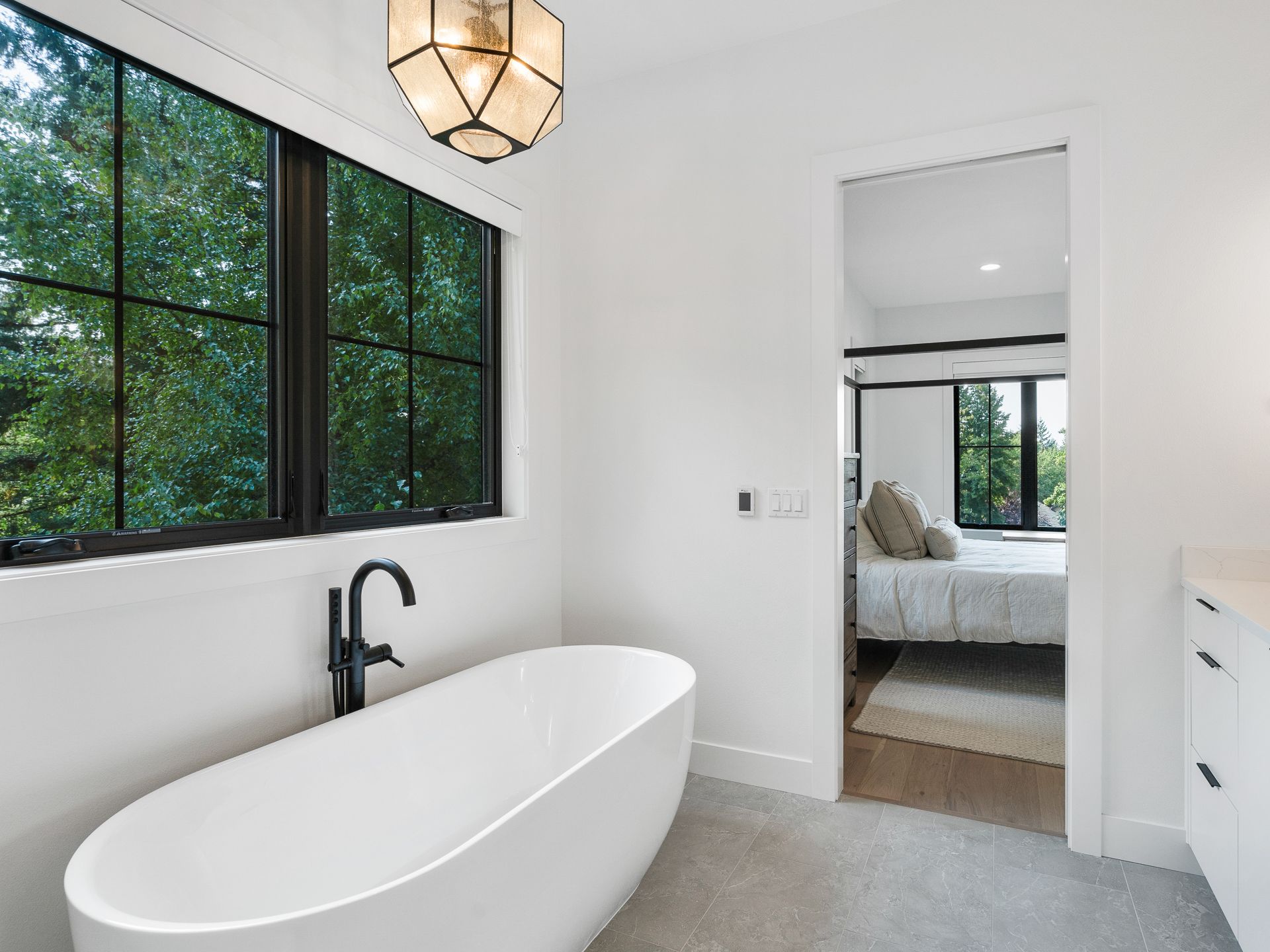Photo of a bathroom with full size shower and freestanding tub.
