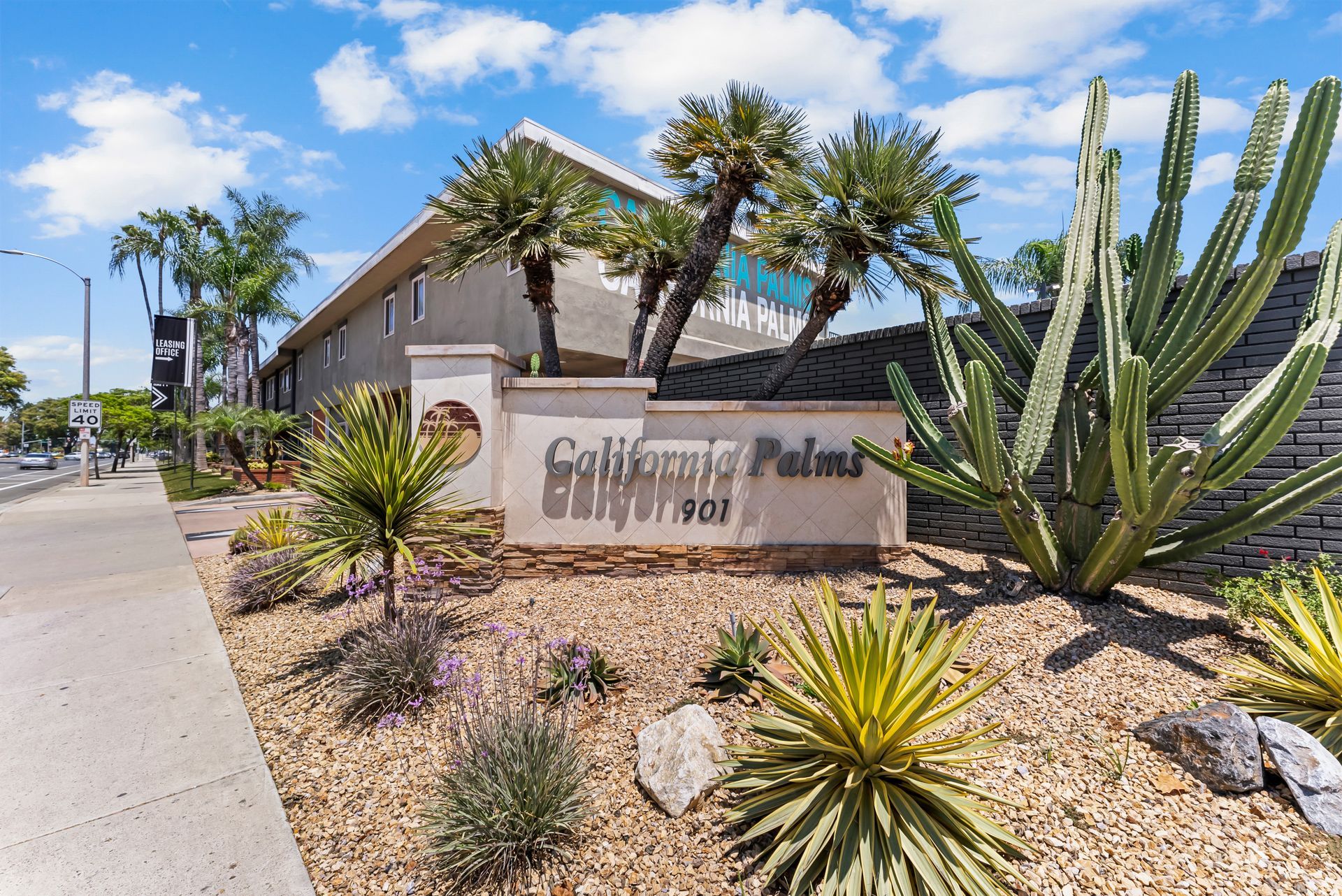 monument sign and plants