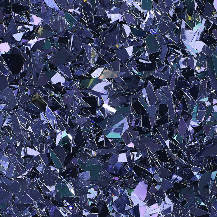 Abstract mosaic of jagged blue, purple, and white glass-like shards