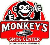 Monkey's Smog Center logo: smiling monkey giving thumbs up, red and white text, classic car, Oakdale California.