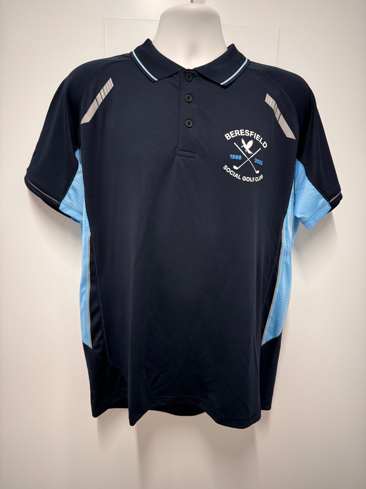 A Row of Colorful Polo Shirts Hanging on Wooden Hangers — Imsprint in East Maitland, NSW