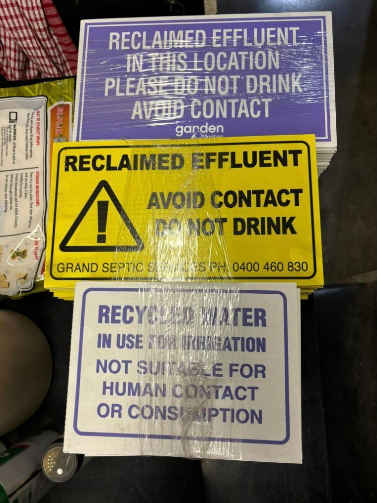A Yellow Sign that Says Reclaimed Effluent — Imsprint in Heatherbrae, NSW