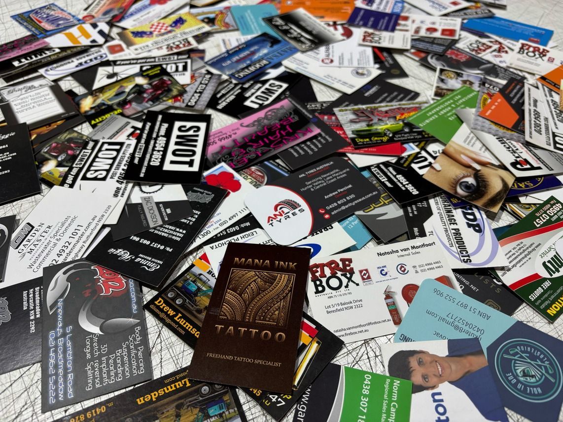 A Stop Sign and A Danger Sign on A Chain Link Fence — Imsprint in East Maitland, NSW
