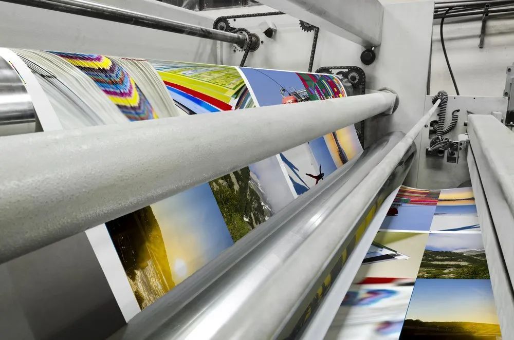 A Printing Machine Is Printing a Lot of Pictures — Imsprint in Lake Macquarie, NSW