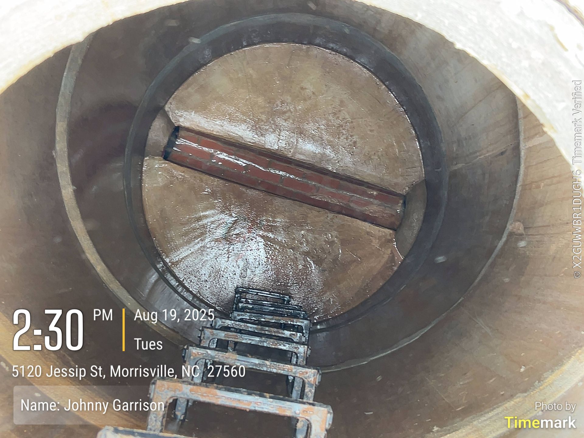 Inside view of a cylindrical structure with a ladder, dated August 19, 2015, and labeled