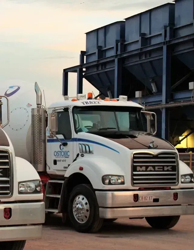 A Mack Truck is Parked Next to Another Truck — Ostojic Group in Berrimah, NT