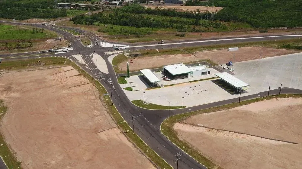 An Aerial View of a Road With a Building in the Middle of It — Ostojic Group in Berrimah, NT