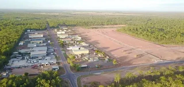 An Aerial View of a Small Town Surrounded by Trees and Dirt — Ostojic Group in Berrimah, NT