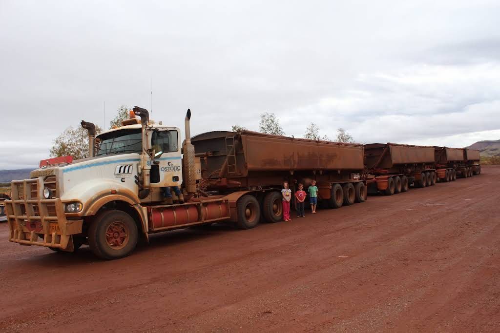 A Large Semi Truck is Parked on a Dirt Road — Ostojic Group in Berrimah, NT