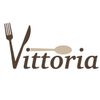 A logo for a restaurant called vittoria with a fork and spoon
