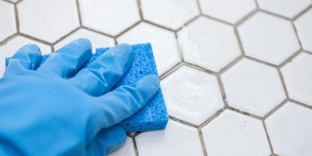 Using Sponge To Clean Tiles — Winter Garden, FL — Andres Professional Services