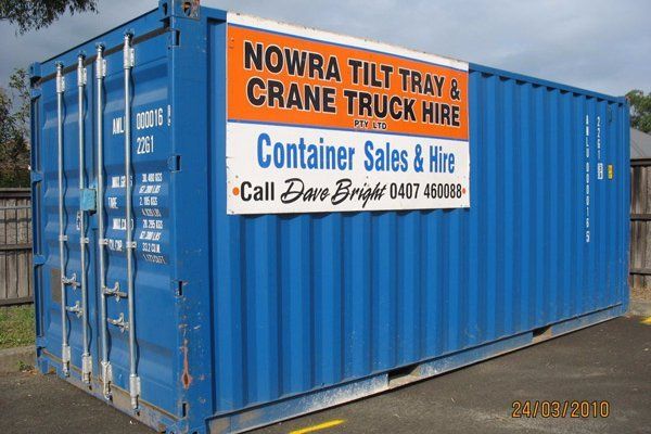 blue container with company banner