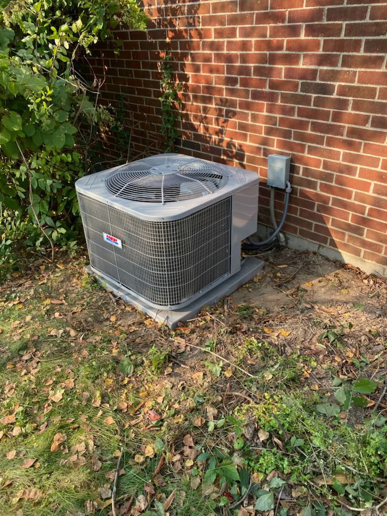 Air Condition Technician Service Checking Air Conditioner— Fairmont, WV — Jeff Stewart Heating & Cooling