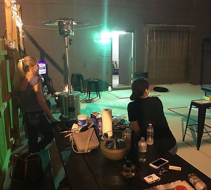 Group Watching Axe Throwing