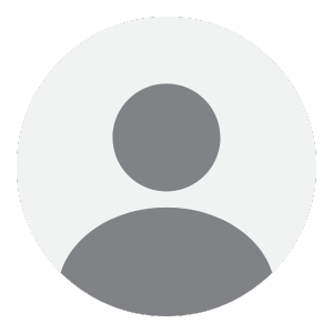 Grey silhouette of a person in a circle, representing a user profile or placeholder image.