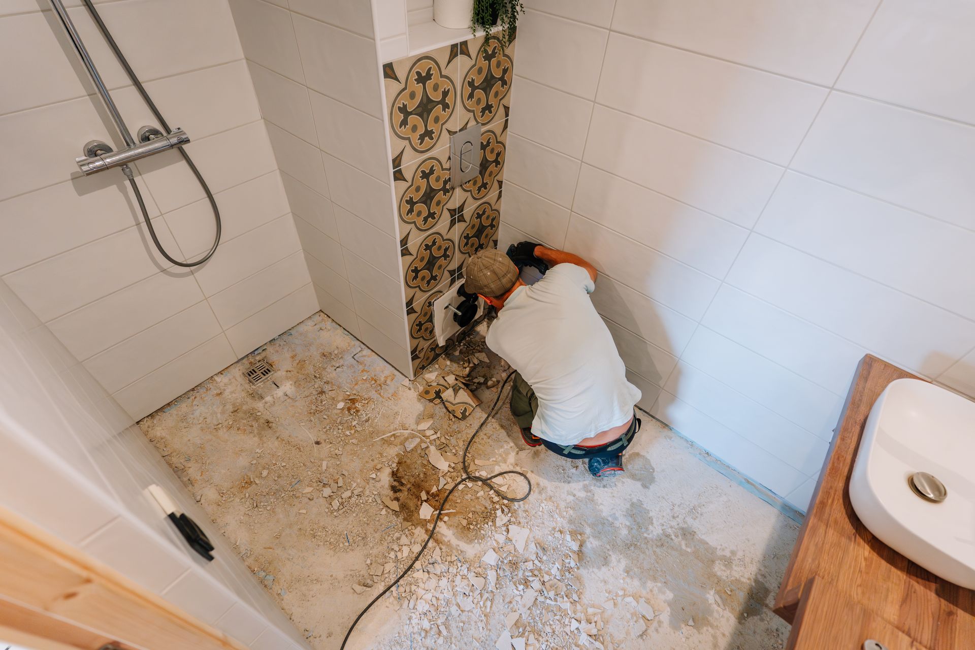 Experienced contractor working on a bathroom remodeling project.