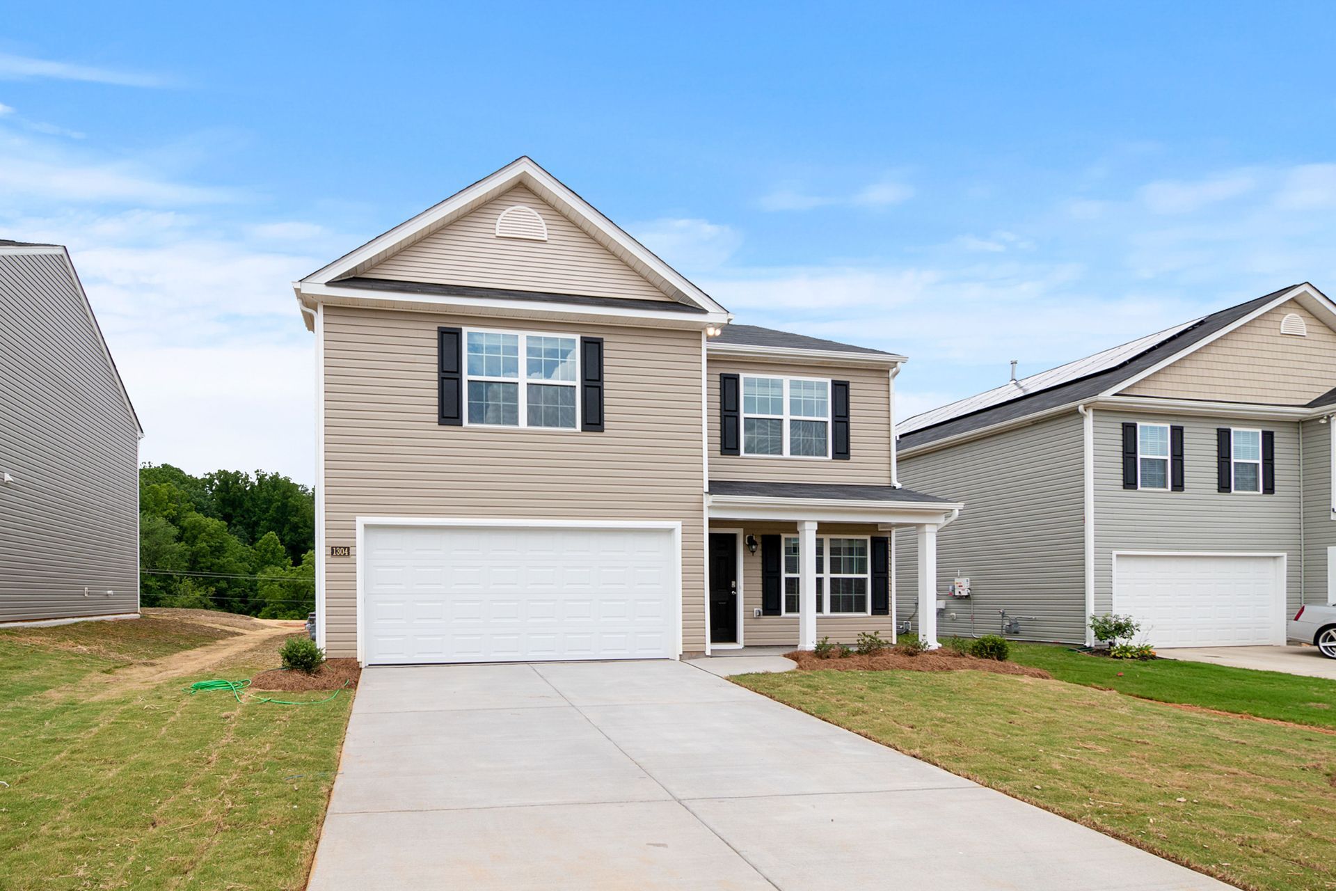 Two-story single family home located in a suburban neighborhood. 